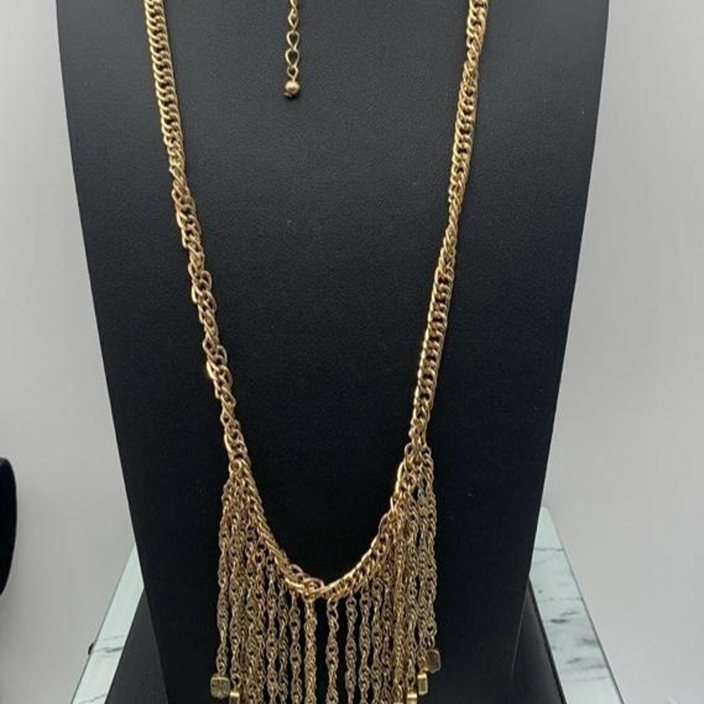 Gold tone chain necklace with fringe and square charms